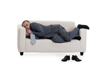 Image showing businessman sleeping on a sofa