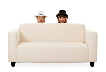 Image showing Two girls on the couch