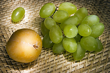 Image showing Still-life with grapes and plum