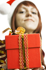 Image showing The girl submits a gift