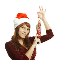 Image showing The woman in a Christmas cap