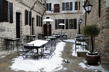 Image showing Empty Courtyard Restaurant in the Winter