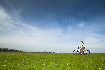 Image showing Riding a bicycle