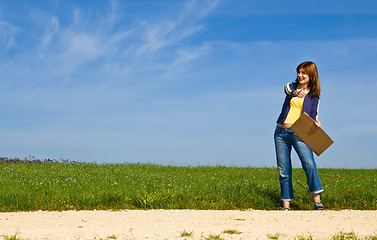 Image showing Hitch hiking girl