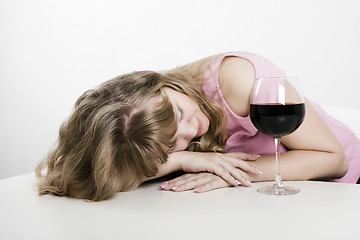 Image showing Alcoholic dream of the young woman