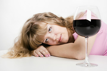 Image showing The young woman with wine glass