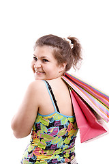 Image showing The happy young woman with purchases