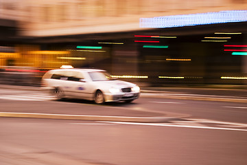 Image showing Speeding Taxi