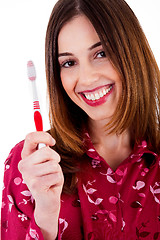 Image showing young lady posing with toothbrush