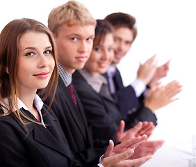 Image showing Colleagues applauding during a business meeting