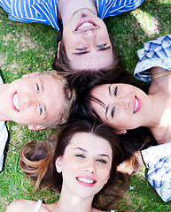 Image showing Young friends forming a circle