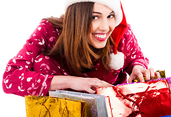 Image showing lady opening christmas gifts