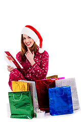 Image showing young lady reading christmas card