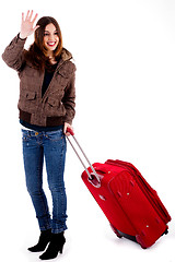 Image showing young woman waving hand