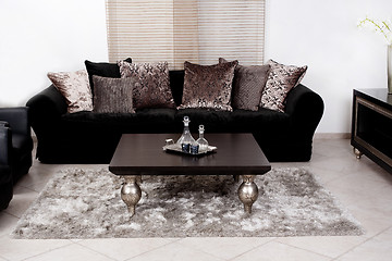 Image showing Modern black coloured fabric couch