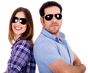 Image showing stylish couple posing back to back