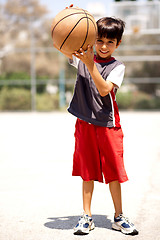 Image showing Adorable boy with basketball