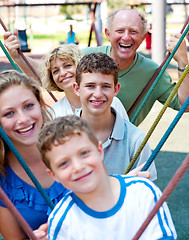 Image showing Close-up shot of a family  playing in the playground