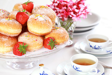 Image showing Berliner - doughnut filled with strawberry jam