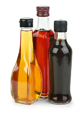 Image showing Bottles with apple and red wine vinegar and soy sauce