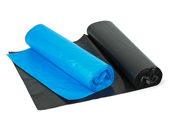 Image showing Pair of rolled  plastic garbage bags