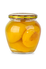 Image showing Glass jar with conserved peach fruits