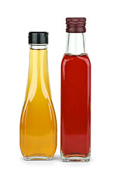 Image showing Two bottles with apple and red wine vinegar