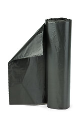 Image showing Roll of black plastic garbage bags