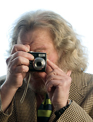 Image showing senior man long hair point and shoot camera