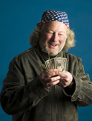 Image showing handsome middle age man flag bandana leather jacket cash money