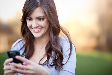 Image showing Woman texting