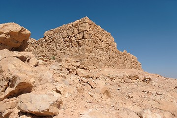 Image showing Ruins of ancient stone tower on the desert hill 