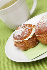 Image showing Profiteroles and tea