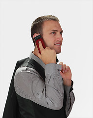 Image showing Young man on the phone