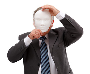 Image showing Man covering his face with mask