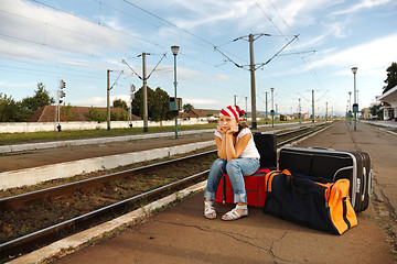 Image showing Young girl in train station