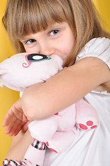 Image showing child with a toy cat