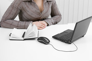 Image showing The young business woman at office