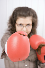 Image showing The serious girl in boxing gloves