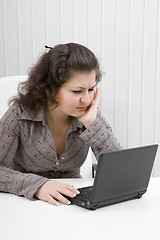 Image showing The young woman with the laptop