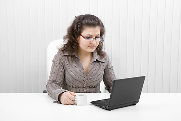 Image showing The young business woman at office