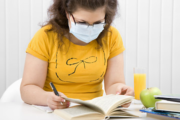 Image showing girl student in a medical mask