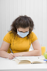 Image showing girl student in a medical mask