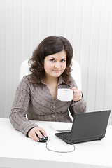 Image showing The young business woman at office