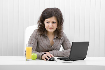 Image showing The business girl with the laptop