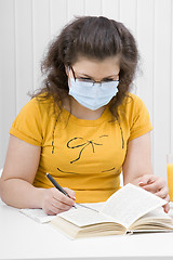 Image showing girl student in a medical mask