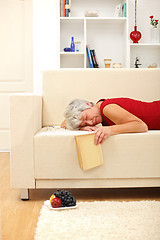 Image showing Senior woman sleeping on sofa
