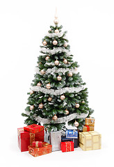 Image showing Christmas tree on white with presents