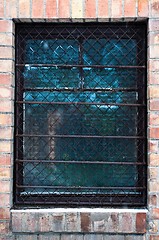Image showing Old window closeup with bars on it