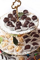 Image showing A plate of chocolates with other treats